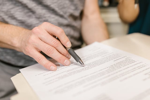a person reviewing a contract