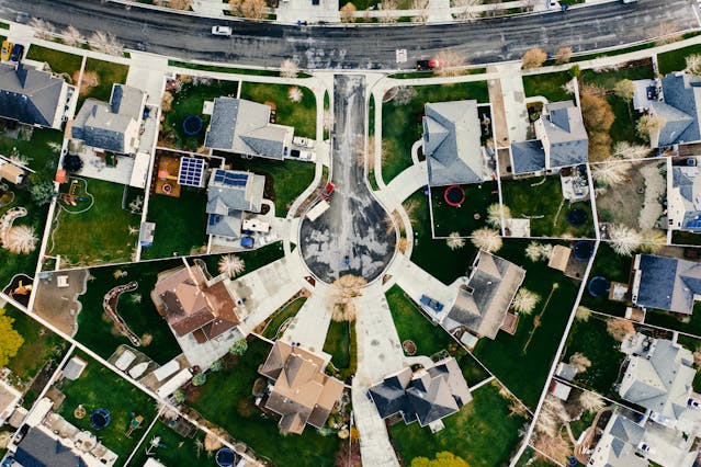 the aerial view of a neighborhood